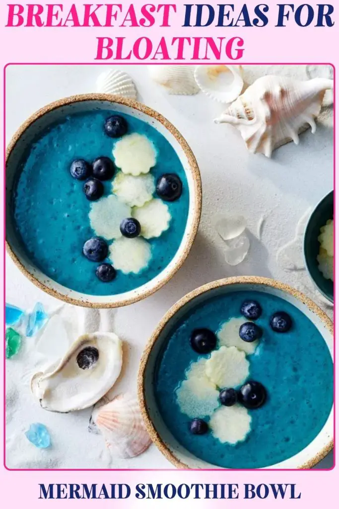 Mermaid Smoothie Bowl image shows a vibrant turquoise smoothie topped with kiwi and blueberries. A bloating breakfast that’s tropical, colorful, and gut-friendly.